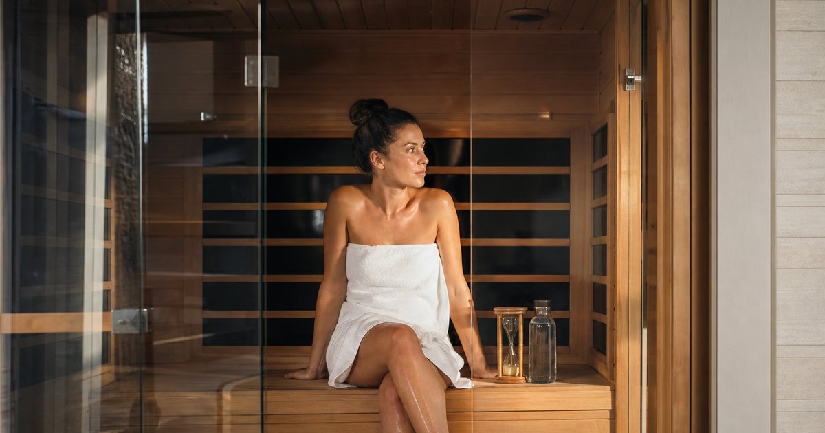 How long should a beginner stay in a home infrared sauna each session?